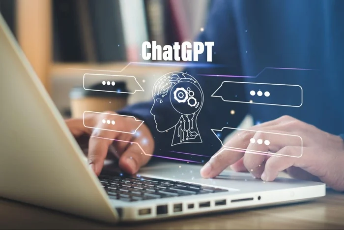 Interface limpa do ChatGPT em um laptop, mostrando uma conversa.]